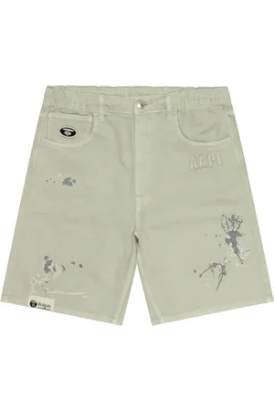 A Bathing Ape Jeans-Shorts mit Farbklecks-Print