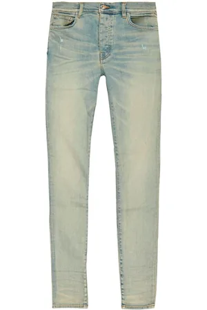 AMIRI Tief sitzende Stack Skinny-Jeans