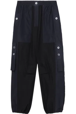 3.1 Phillip Lim Hose mit Kontrasttasche