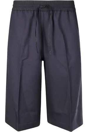 STUDIO NICHOLSON Knielange Shorts