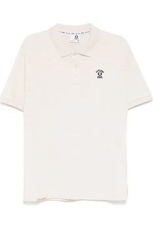 A Bathing Ape Poloshirt mit Moonface-Logo