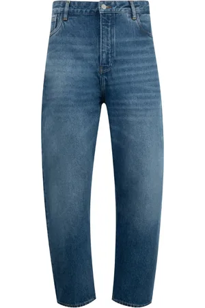 STUDIO NICHOLSON Jeans mit Logo-Patch