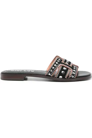 Bibi Lou Flache Sandalen mit Nieten