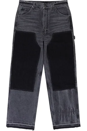 AMIRI Jeans mit Kontrasteinsätzen
