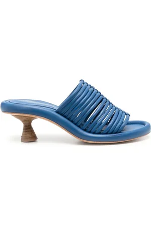 Paloma Barceló Mules mit Design-Absatz