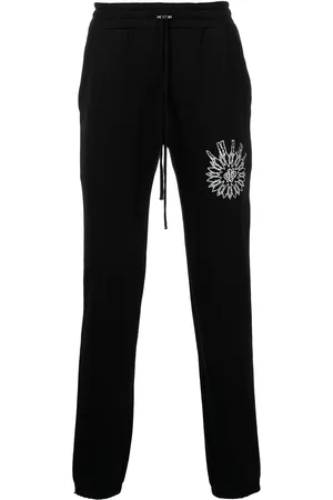 AMIRI Schmale Jogginghose mit Logo