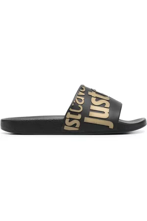 Roberto Cavalli Damen Sneakers - Logo-embossed slip-on slides