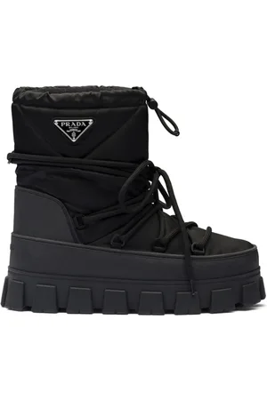 Prada Schneestiefel mit Logo-Schild