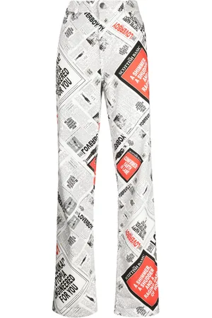 Charles Jeffrey Loverboy Weite Jeans mit Zeitungs-Print