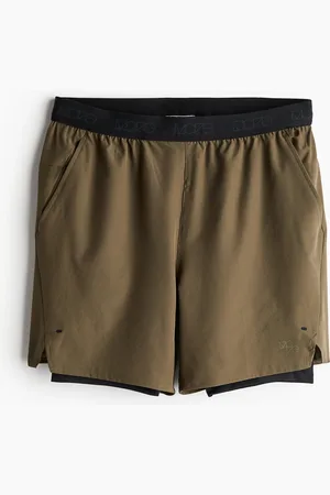 H&M DryMove™ Doppellagige Sportshorts