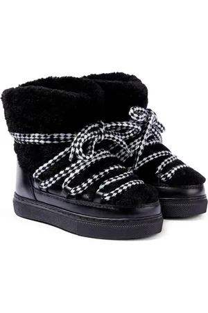 INUIKII Schneestiefel Curly aus Shearling und Leder
