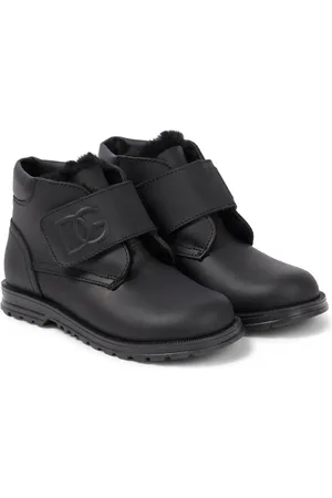 Dolce & Gabbana Ankle Boots aus Leder mit Faux Shearling