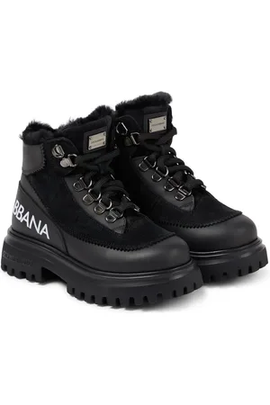 Dolce & Gabbana Schnürstiefel aus Leder mit Shearling