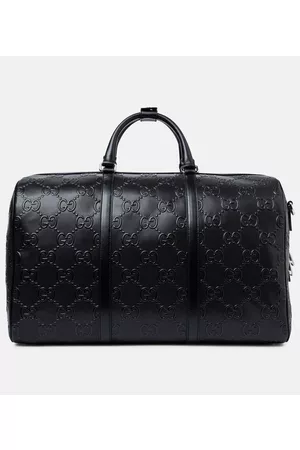 Gucci Reisetaschen - Geprägte Reisetasche aus Leder
