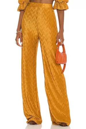 House of Harlow X REVOLVE Sevigny Pant in - Mustard. Size L (also in M, S, XL, XS, XXS).